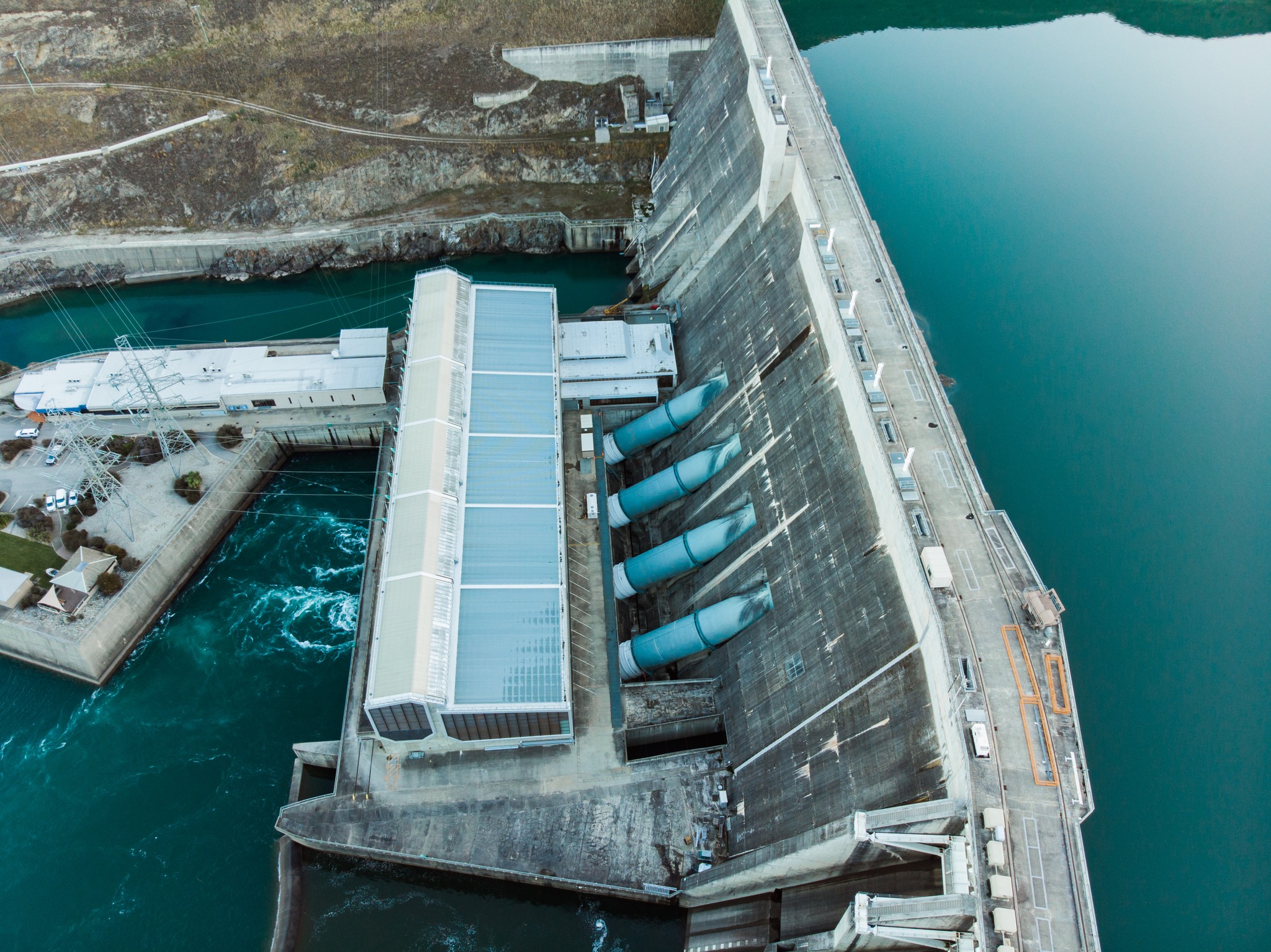 Tourists jet boating with Clyde Dam Tours on Lake Dunstan near Clyde
